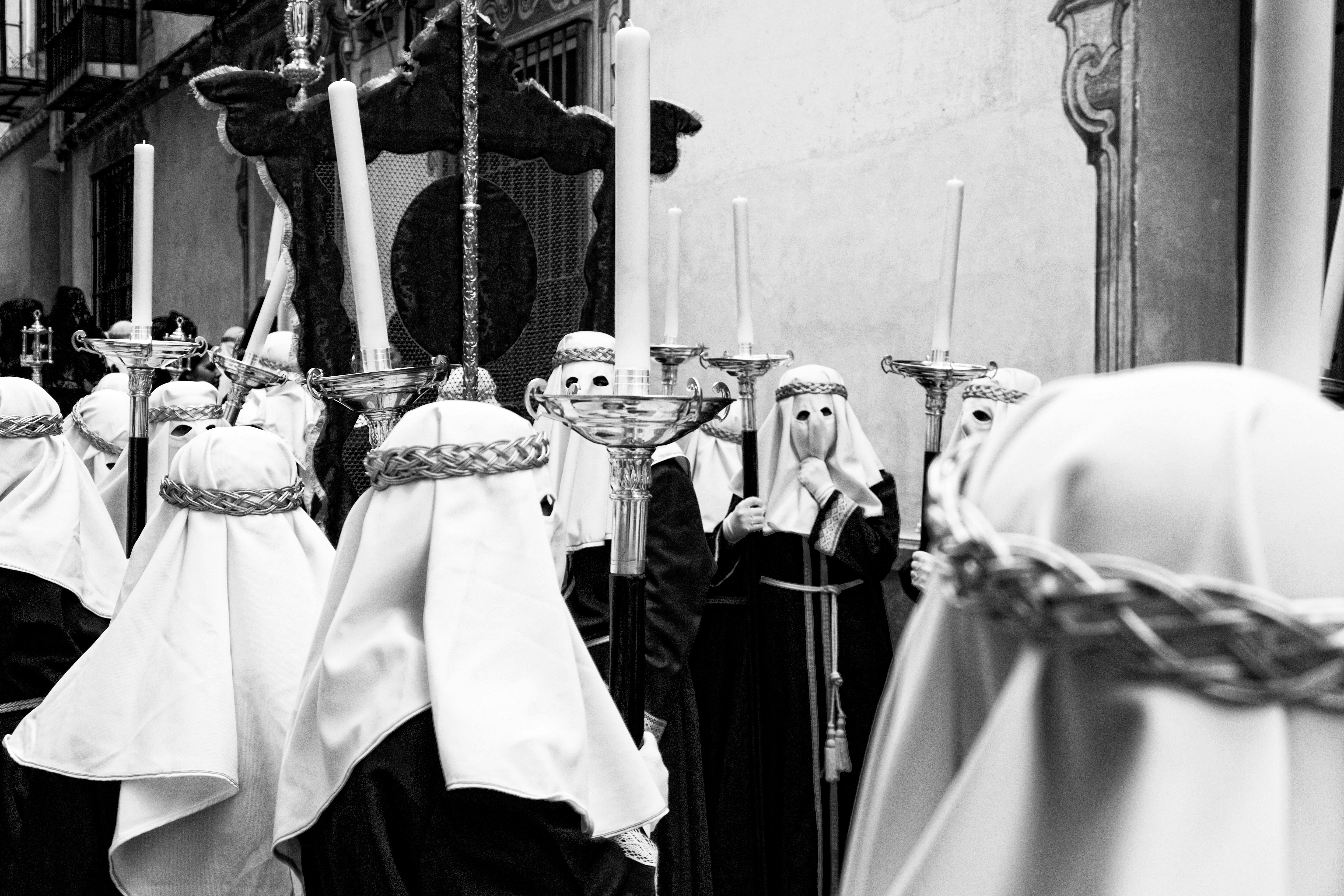 white and black clothes hanged on clothes hanger